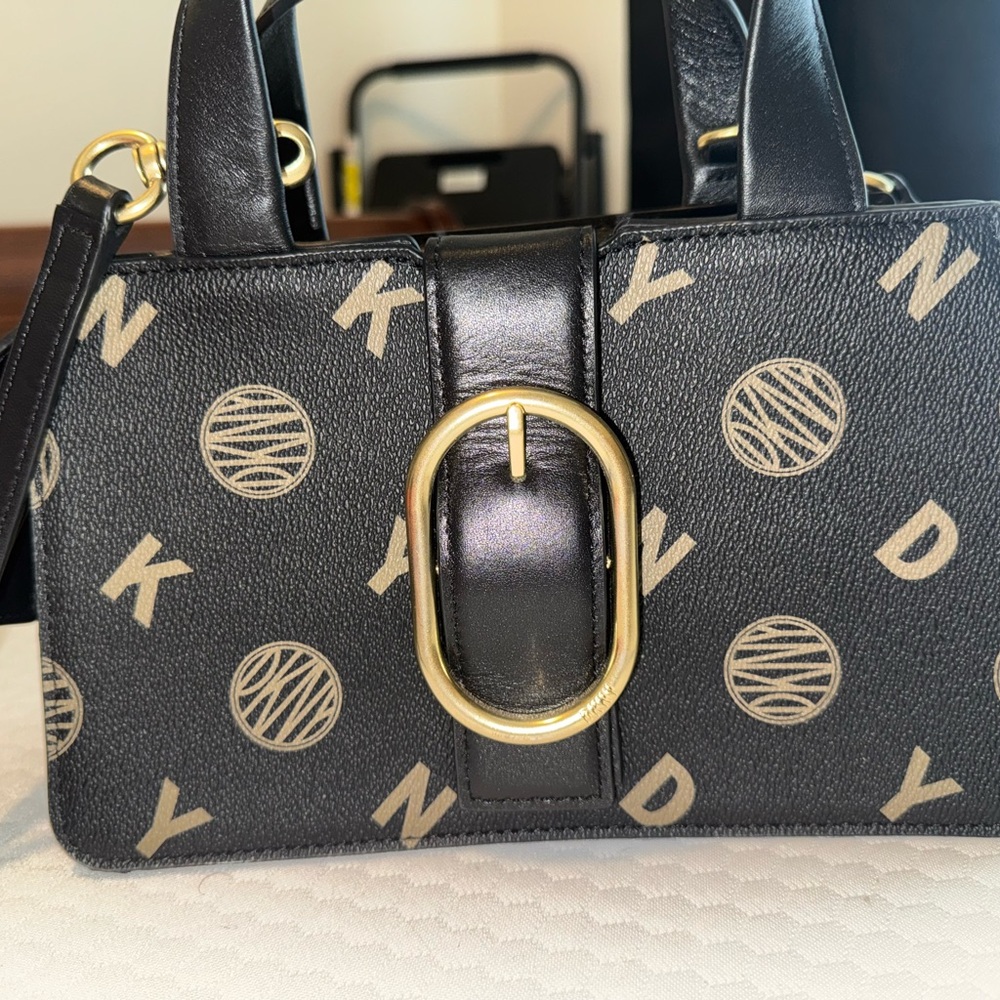 DKNY Black and Gold Shoulder Bag with Elegant Design